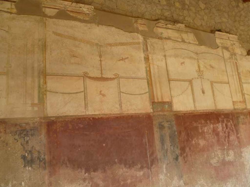 Oplontis Villa of Poppea, September 2021. 
Portico 40, east wall, painted wall decoration of deer/gazelle. Photo courtesy of Klaus Heese.
