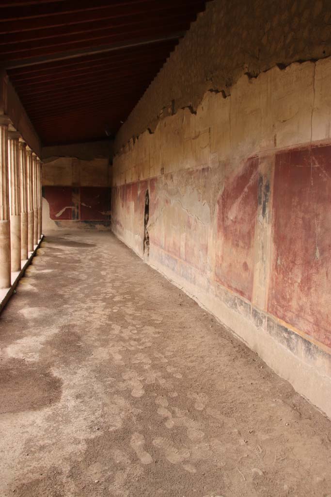 Oplontis, September 2011. Room 41, cubiculum. Looking through doorway in north wall of portico 24, with painted decoration above the doorway. Photo courtesy of Michael Binns.