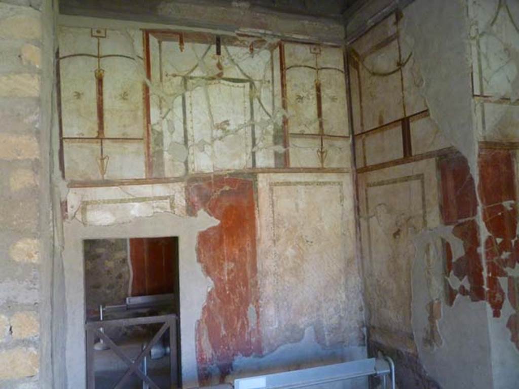 Oplontis, May 2010. Room 41, detail of painted decoration from upper north wall of alcove. Photo courtesy of Buzz Ferebee. 
