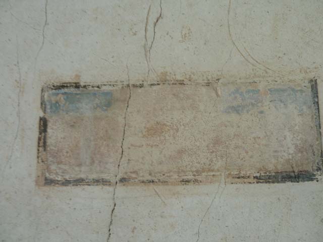 Oplontis, September 2015. Painted panel on south wall of portico to west of doorway into room 66. 