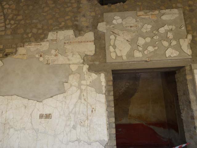 Oplontis, September 2011. Area 60, west portico wall with doorway to room 90.  
Looking west. Photo courtesy of Michael Binns.


