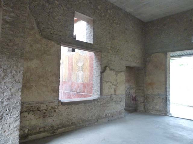 Oplontis, September 2011. Room 66, looking towards south wall with niche, and south-west corner. Photo courtesy of Michael Binns.
