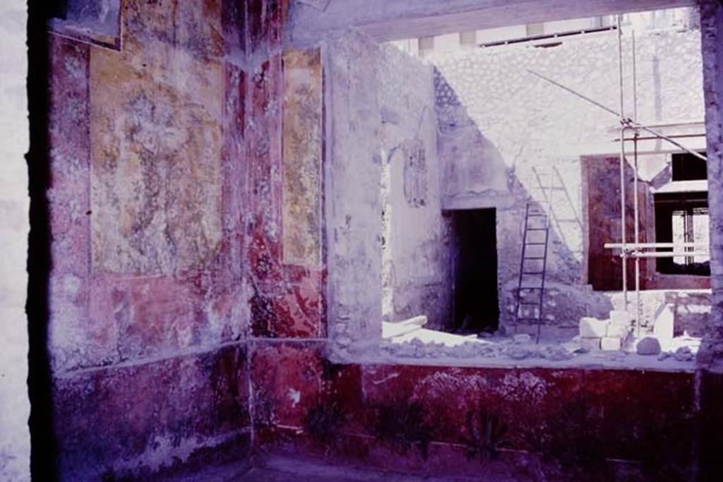 Oplontis, 1977. Room 68, north-west corner and north wall with window into room 69. Looking across room 69, to doorway of room 71. Photo by Stanley A. Jashemski.   
Source: The Wilhelmina and Stanley A. Jashemski archive in the University of Maryland Library, Special Collections (See collection page) and made available under the Creative Commons Attribution-Non Commercial License v.4. See Licence and use details. J77f0371
