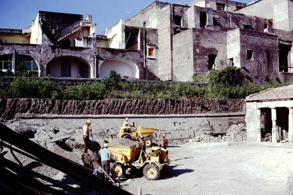 Oplontis Villa of Poppea, 1975 or 1974. Further clearing of lapilli in area 59, the south-east peristyle. Looking south-west. Photo by Stanley A. Jashemski.   
Source: The Wilhelmina and Stanley A. Jashemski archive in the University of Maryland Library, Special Collections (See collection page) and made available under the Creative Commons Attribution-Non Commercial License v.4. See Licence and use details. J74f0895

