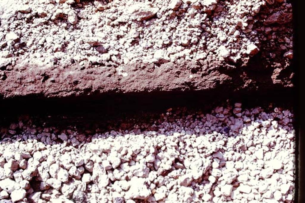 Oplontis, 1977. Differences in the layers of the eruption material. Photo by Stanley A. Jashemski.   
Source: The Wilhelmina and Stanley A. Jashemski archive in the University of Maryland Library, Special Collections (See collection page) and made available under the Creative Commons Attribution-Non Commercial License v.4. See Licence and use details. J77f0112
