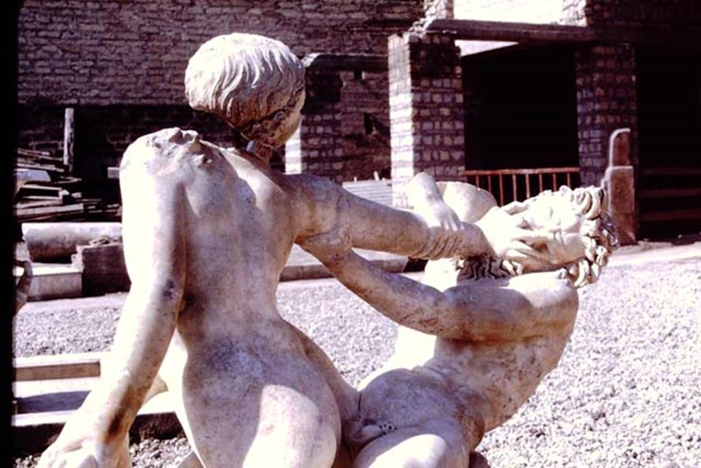 Oplontis Villa of Poppea, 1978. Detail from marble statue of hermaphrodite and faun. 
Photo by Stanley A. Jashemski.   
Source: The Wilhelmina and Stanley A. Jashemski archive in the University of Maryland Library, Special Collections (See collection page) and made available under the Creative Commons Attribution-Non Commercial License v.4. See Licence and use details.
J78f0053
SAP inventory number 72800.
