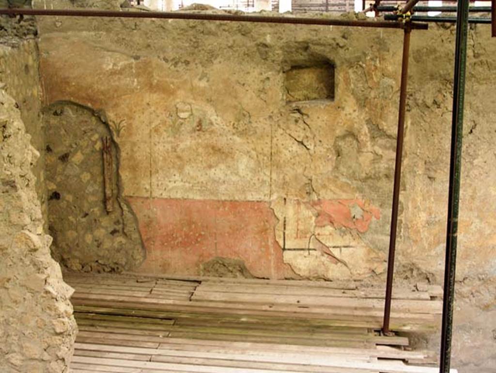 Oplontis, Villa of Lucius Crassius Tertius. March 2005. Room on north side with niche and what appears to be two layers of painted decoration. 
Photo courtesy of Massimo Gravili.
