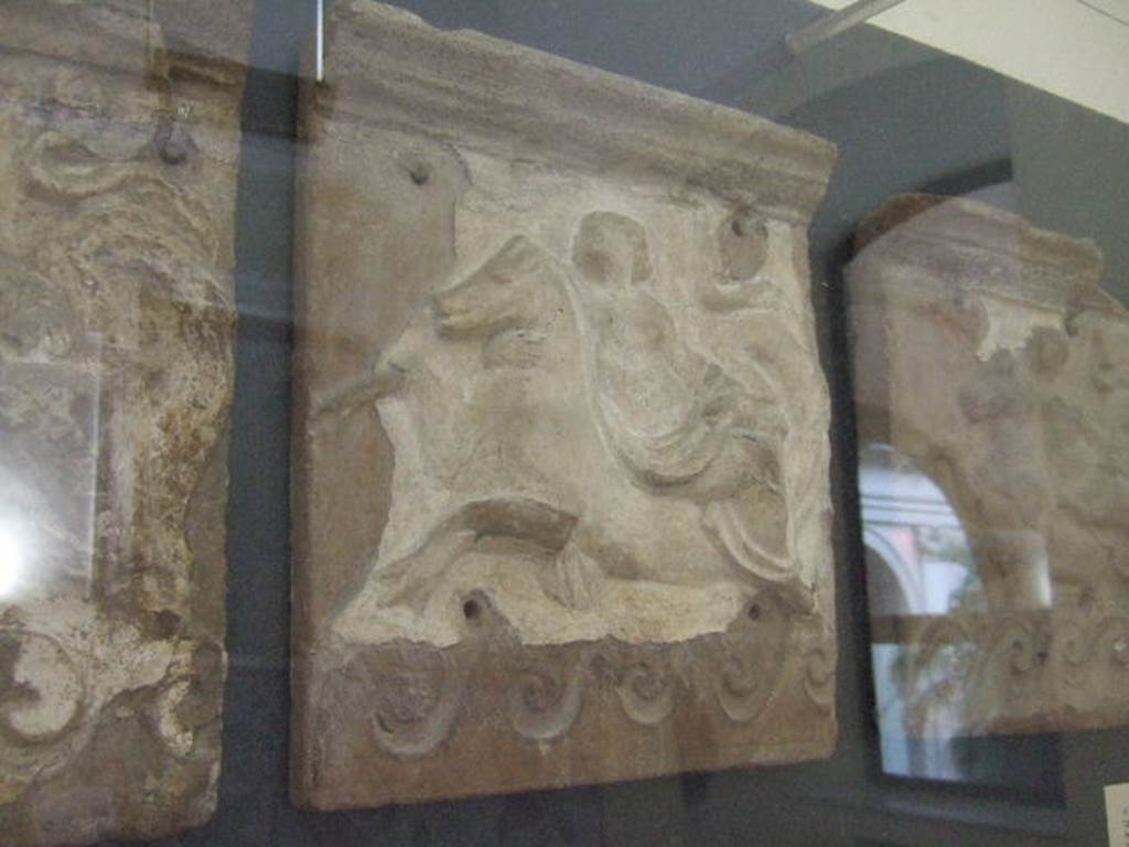 VI.12.2 Pompeii. Terracotta facing with Nereid on a sea horse. Found in first peristyle. Now in Naples Archaeological Museum. Inventory number 21516.