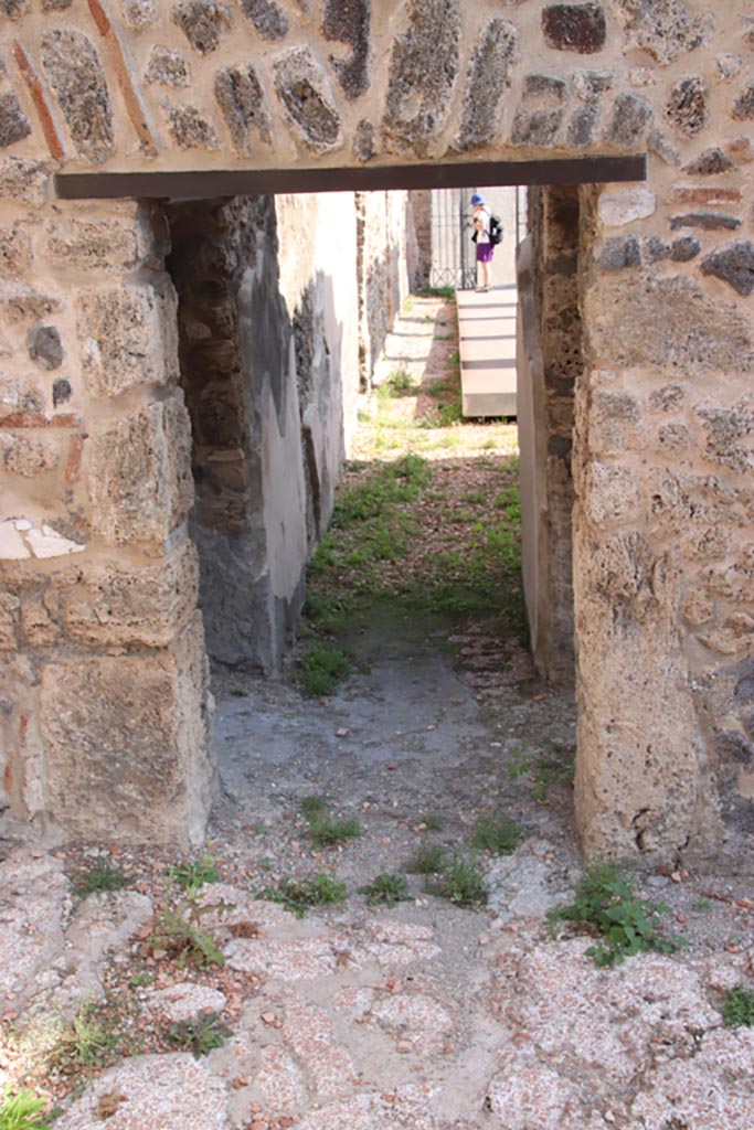 HGW24 Pompeii. Villa of Diomedes. October 2023. 
Looking east along corridor into west ala, and across north portico. Photo courtesy of Klaus Heese.
(Villa Diomedes Project – area 33).
(Fontaine, from west end of corridor 2.4, from terrace).

