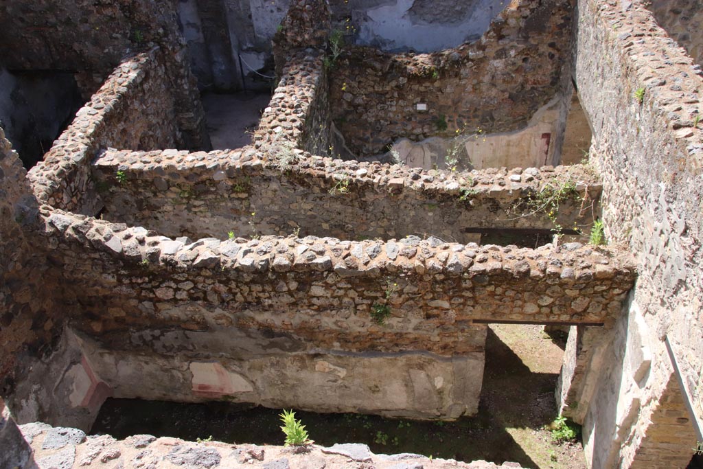 HGW24 Pompeii. Villa of Diomedes. May 2024. Looking south, down onto lower area to south of terrace. Photo courtesy of Klaus Heese.
(Fontaine, looking across rooms (from upper left) 5,4, stairs to lower floor, rooms 5,1 and 5,4, upper centre.
In centre - corridor 5,3, and south wall of room 5,5, on lower side).

