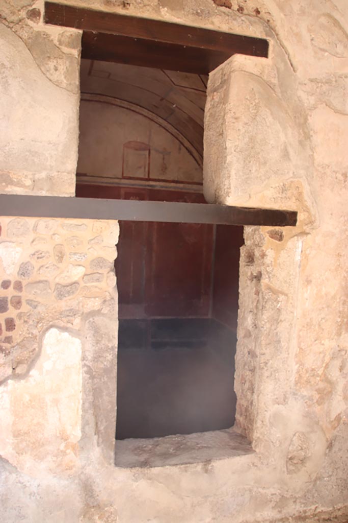 HGW24 Pompeii. Villa of Diomedes. October 2023. 
Looking east into room through window from north end of east portico. Photo courtesy of Klaus Heese.
(Villa Diomedes Project – area 61).
(Fontaine, room 5,13).
