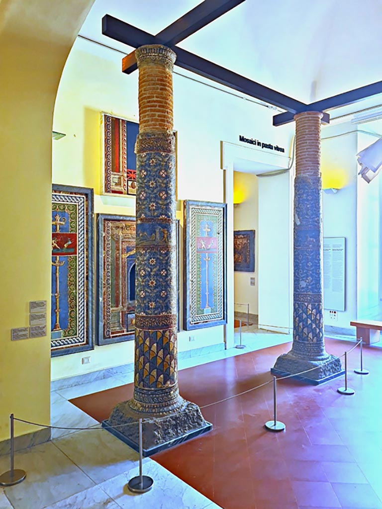 HGE12 Villa of the Mosaic Columns. September 2024.  
Detail of two of the columns on display in Naples Archaeological Museum. Photo courtesy of Giuseppe Ciaramella.

