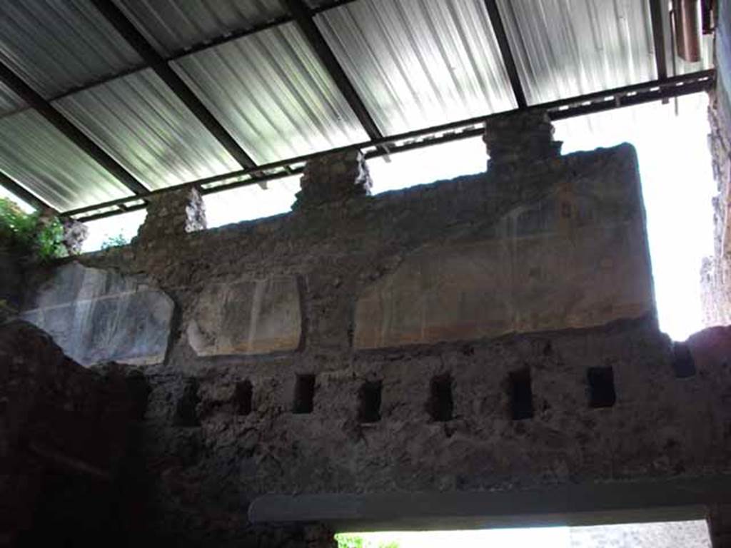 Villa of Mysteries, Pompeii. May 2010. Room 66, remains of paintings on upper south wall of entrance. Looking south-east. 
