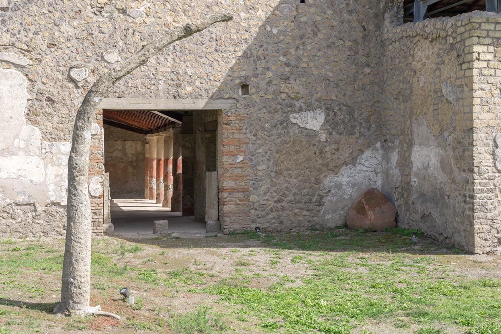 Villa Regina, Boscoreale. October 2021. Looking towards south side with entrance doorway XIV. Photo courtesy of Johannes Eber.