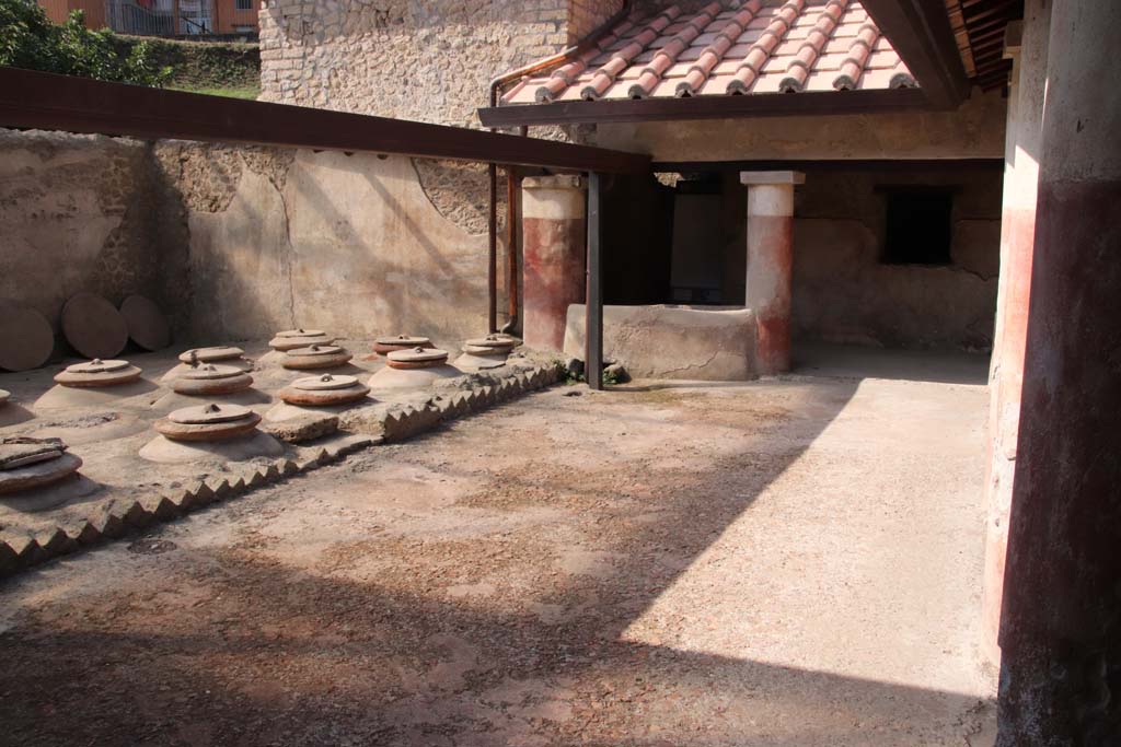 Villa Regina, Boscoreale. September 2021. 
Room I, cella vinaria, looking across courtyard towards south portico. Photo courtesy of Klaus Heese.
